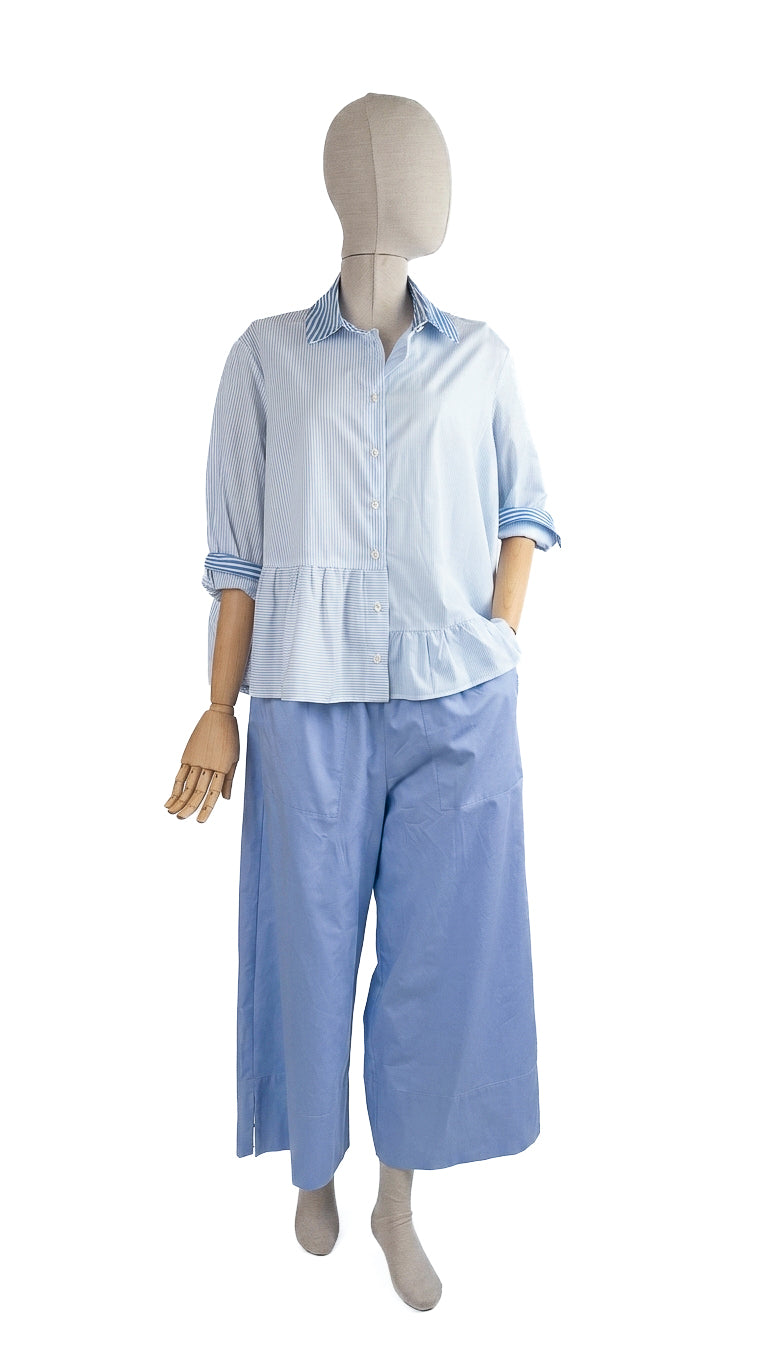 Pantaloni crop con spacchi